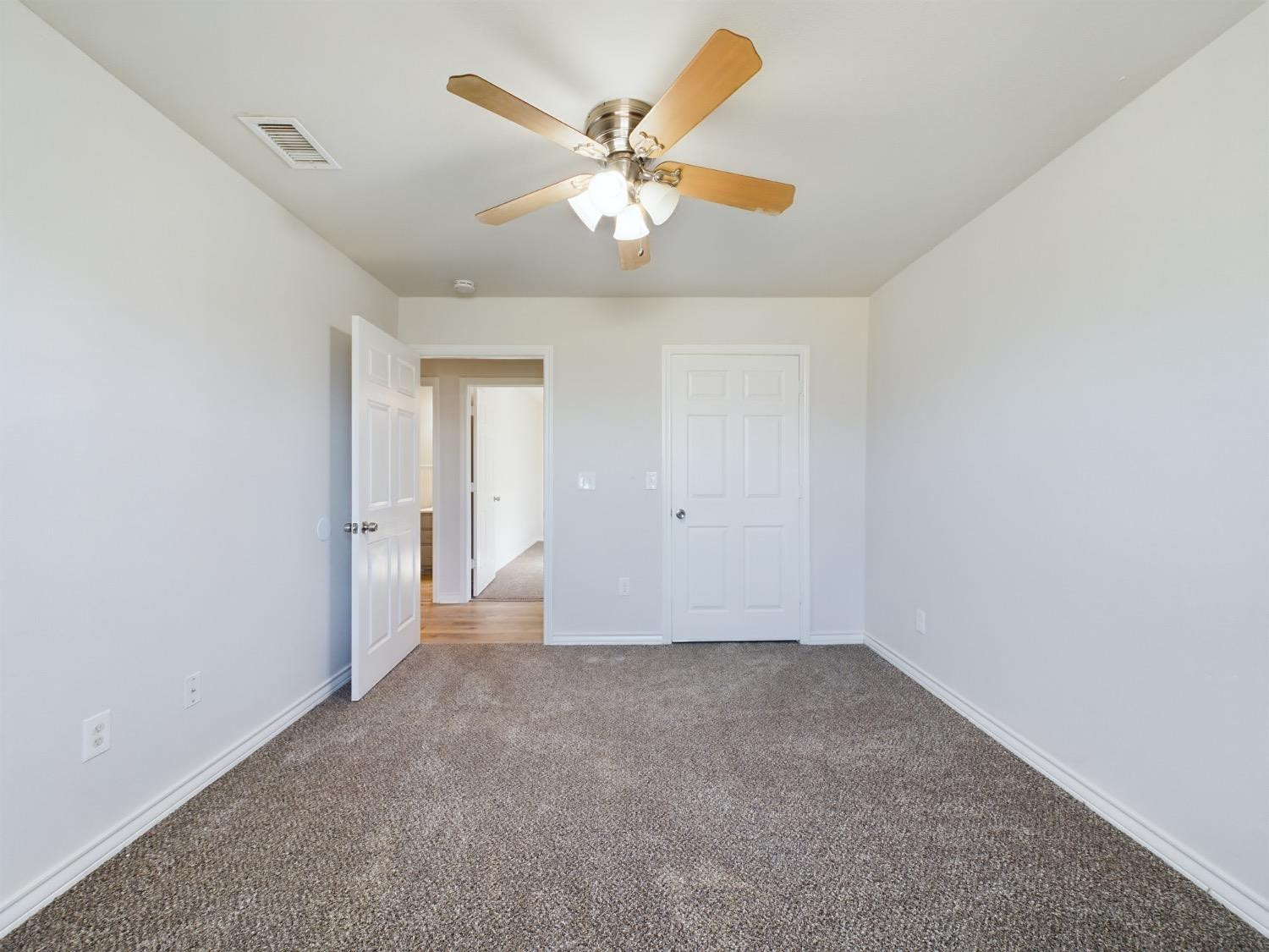 6306 25th Street Lubbock, TX 79407 - Photo 12 of 37 a view of an empty room with window