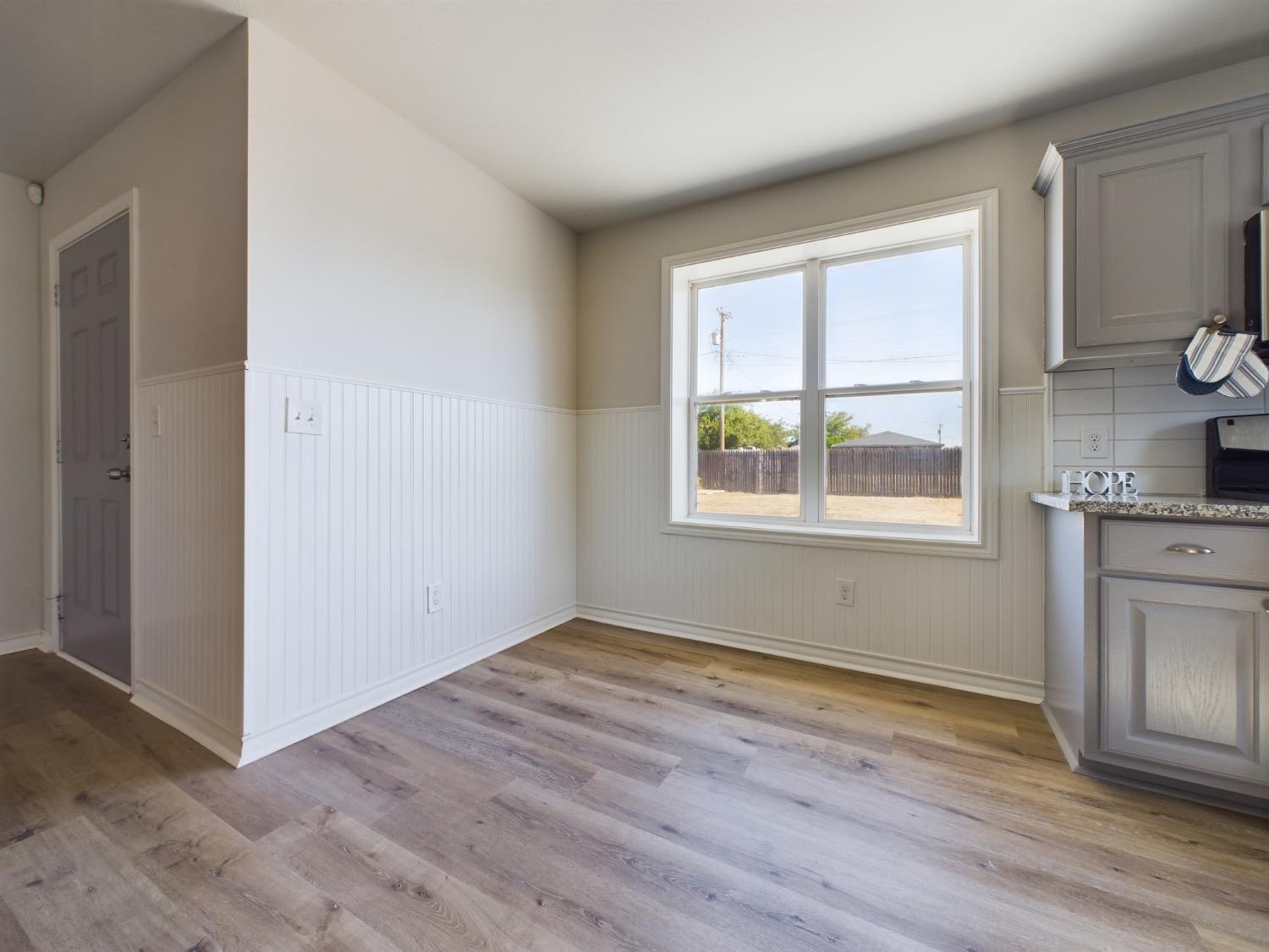 6306 25th Street Lubbock, TX 79407 - Photo 23 of 37 an empty room with windows and closet