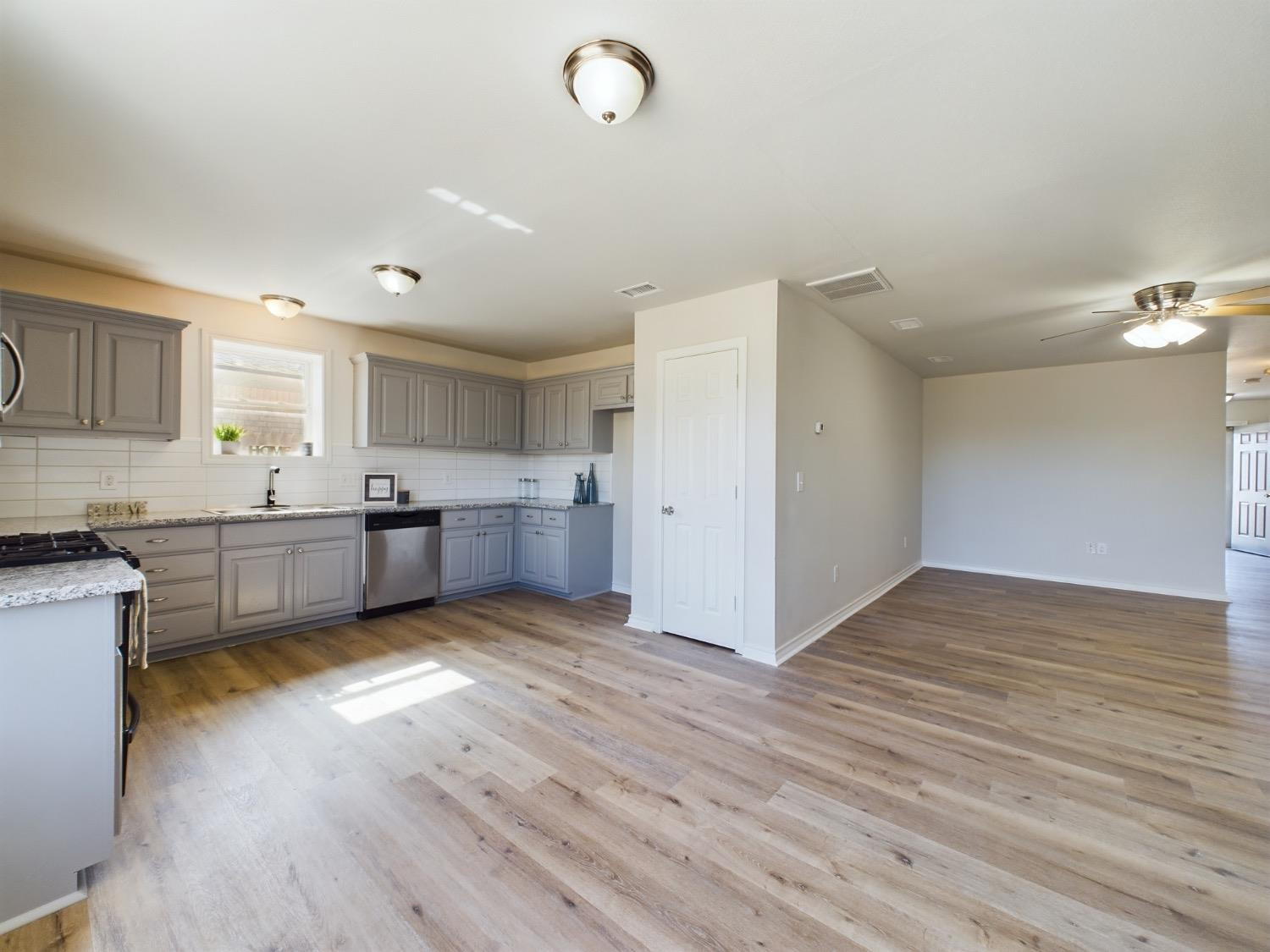 6306 25th Street Lubbock, TX 79407 - Photo 28 of 37 a view of kitchen with wooden floor