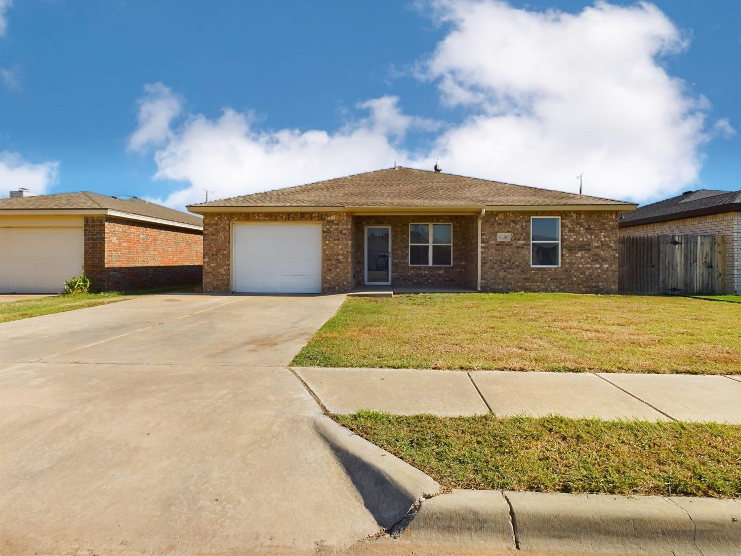 6306 25th Street Lubbock, TX 79407 - Photo 35 of 37 a view of house with yard and in front of it