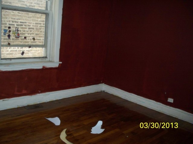 5010 North Troy Street Chicago, IL 60625 - Photo 11 of 19 a view of empty room with wooden floor and fan