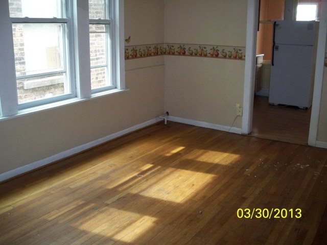 5010 North Troy Street Chicago, IL 60625 - Photo 15 of 19 a view of a room with window