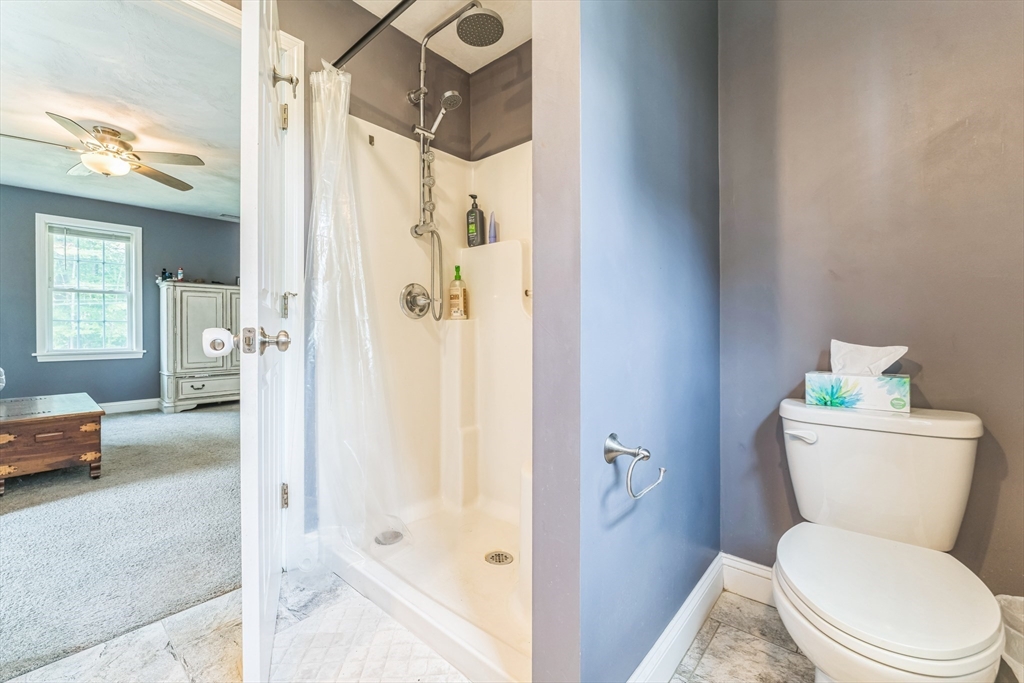121 Adams Road East Brookfield, MA 01515 - Photo 14 of 28 a bathroom with a toilet and a shower