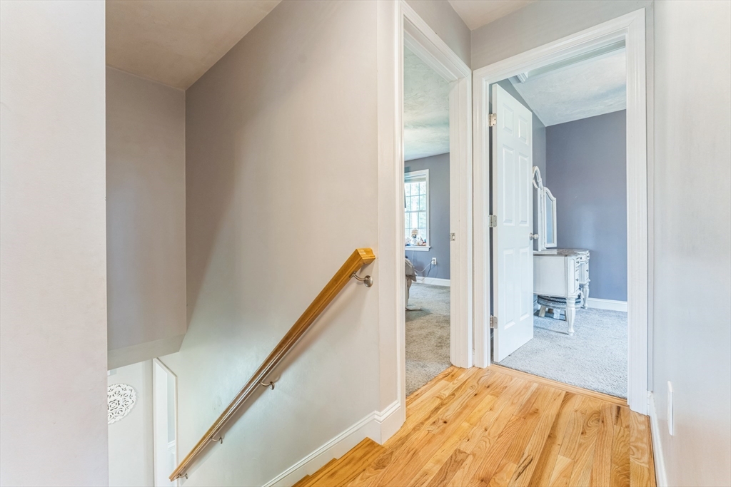 121 Adams Road East Brookfield, MA 01515 - Photo 19 of 28 a bedroom with a bed and a view of bathroom