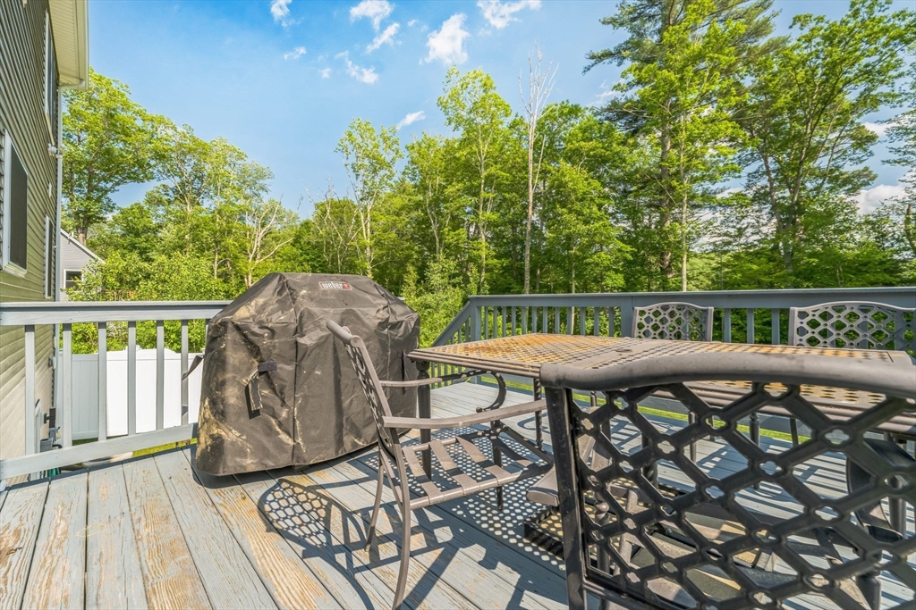 121 Adams Road East Brookfield, MA 01515 - Photo 21 of 28 a view of a roof deck with furniture