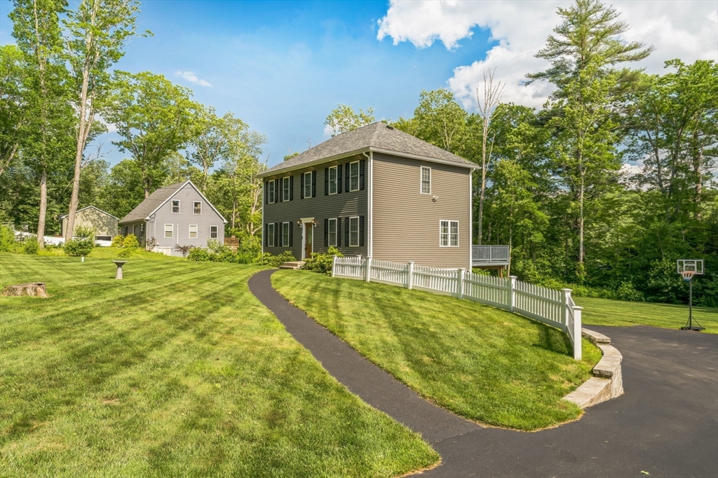 121 Adams Road East Brookfield, MA 01515 - Photo 23 of 28 a view of a house with basketball court