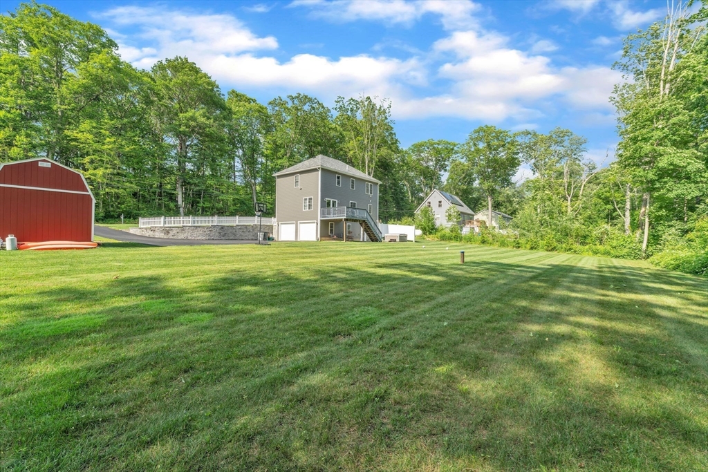 121 Adams Road East Brookfield, MA 01515 - Photo 25 of 28 a house view with a garden space