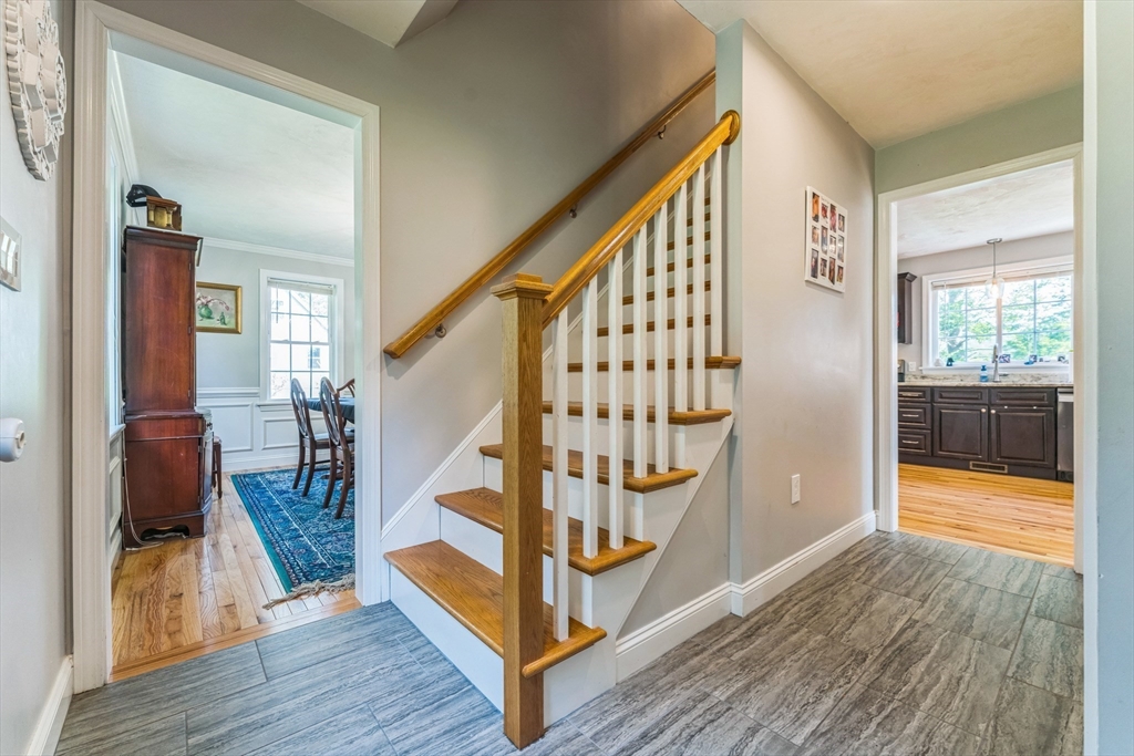 121 Adams Road East Brookfield, MA 01515 - Photo 3 of 28 a view of an entryway with wooden floor and door
