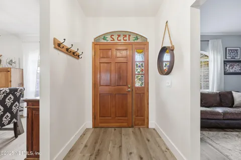 a view of a hallway with entryway