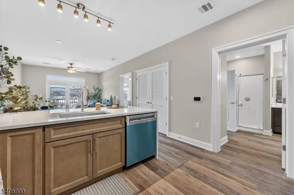 a bathroom with a sink and mirror