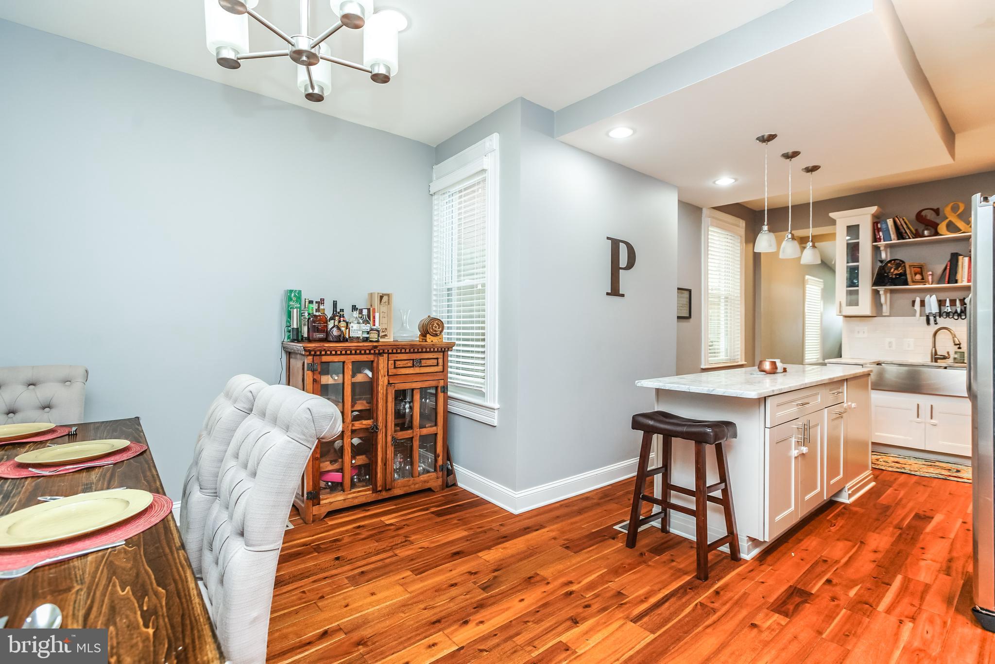 3537 Roland Avenue Baltimore, MD 21211 - Photo 5 of 36 The dining area is open to the kitchen.