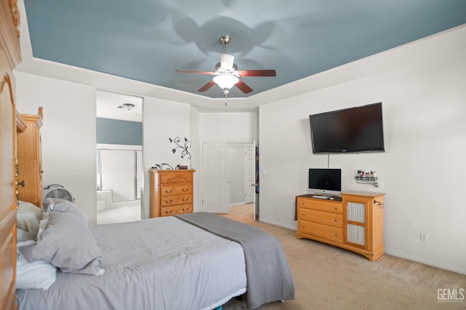 Undisclosed Address Bakersfield, CA 93306 - Photo 29 of 42 a bedroom with bed and tv