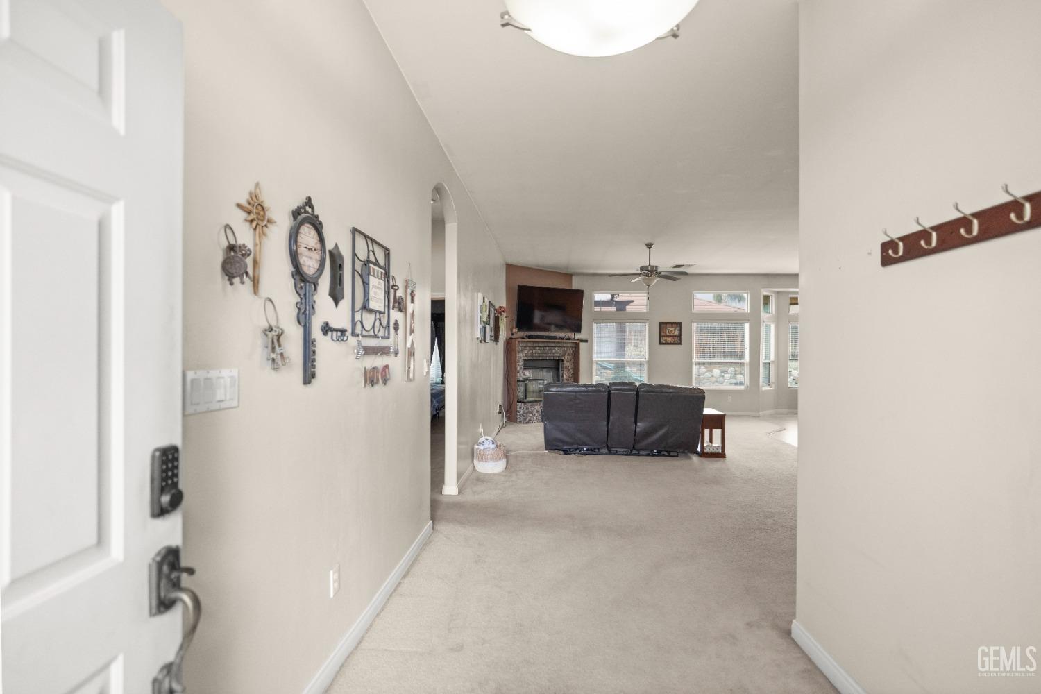 Undisclosed Address Bakersfield, CA 93306 - Photo 5 of 42 a view of a livingroom with furniture and a flat screen tv