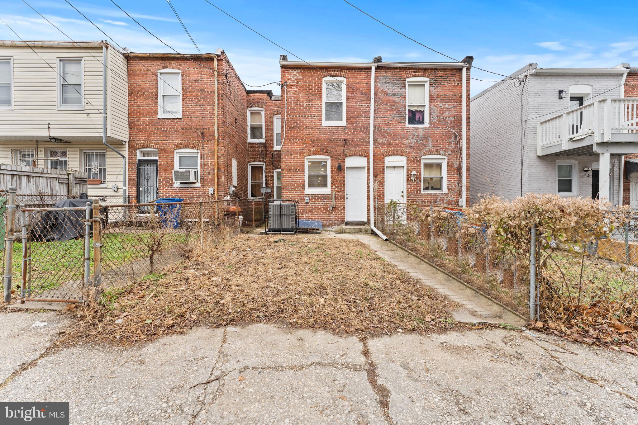 2560 Robb Street Baltimore, MD 21218 - Photo 10 of 19 a view of a building with a yard