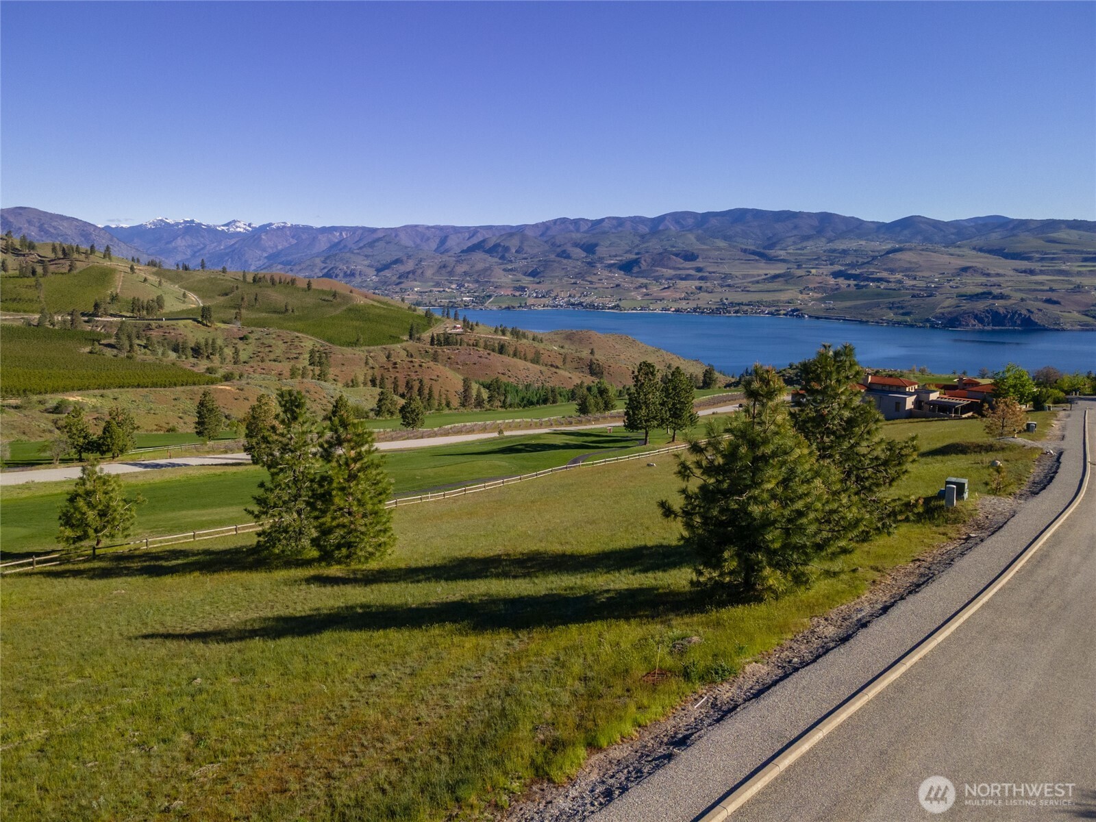 322 Paintbrush Road Chelan, WA 98816 - Photo 9 of 26 a view of a lake with a mountain
