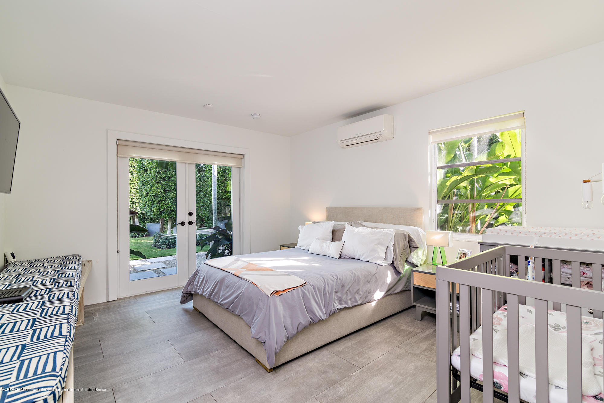 321 Churchill Road West Palm Beach, FL 33405 - Photo 14 of 44 a bedroom with a bed and a window