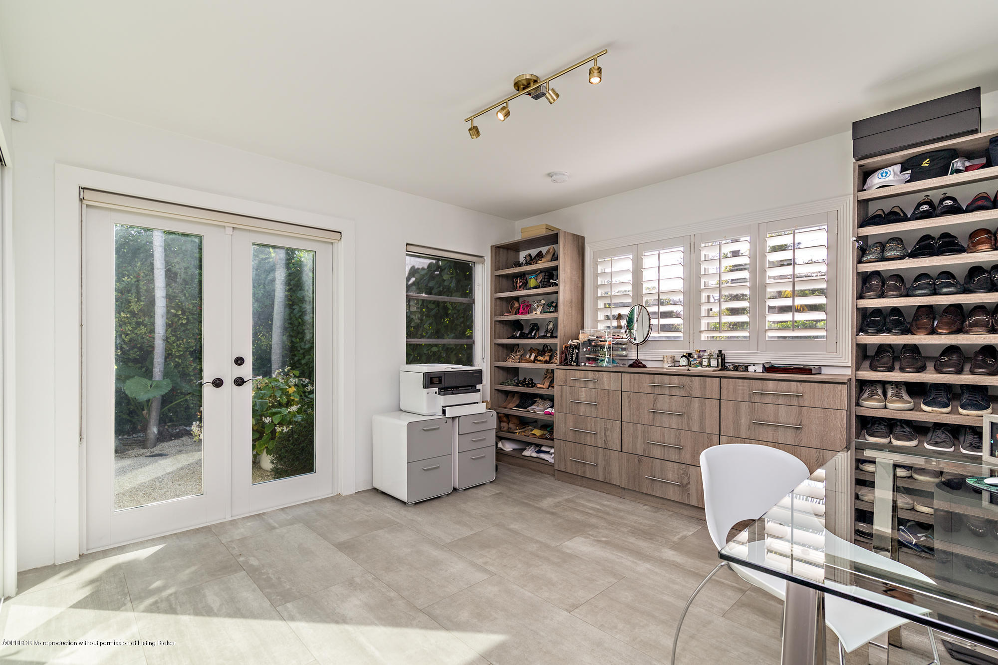 321 Churchill Road West Palm Beach, FL 33405 - Photo 16 of 44 a room with furniture a rug and white walls