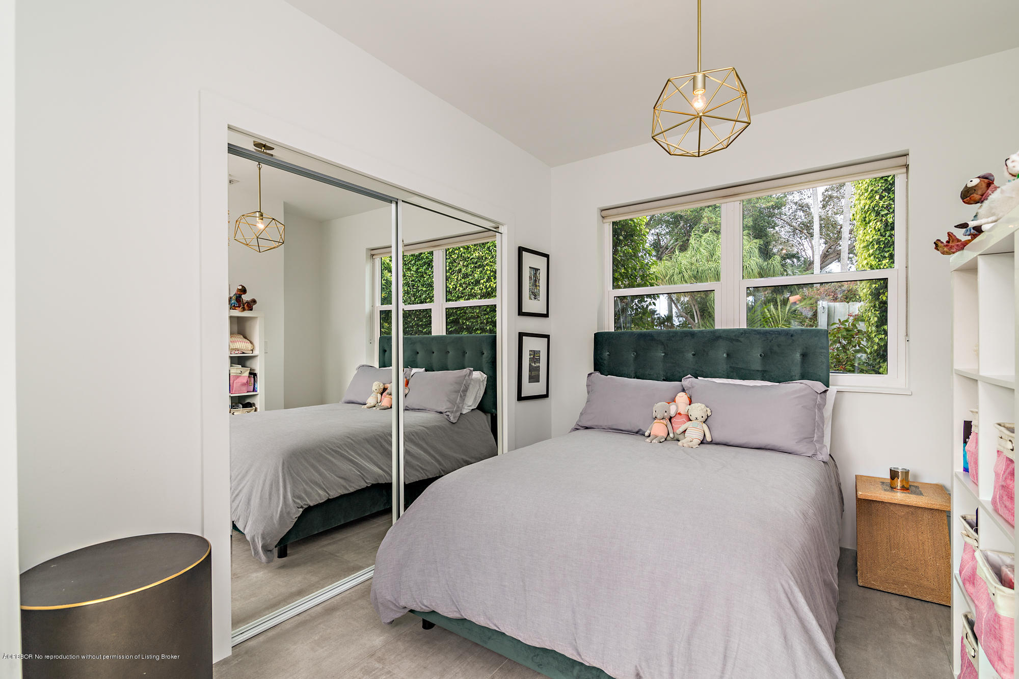 321 Churchill Road West Palm Beach, FL 33405 - Photo 17 of 44 a bedroom with two beds and a large window