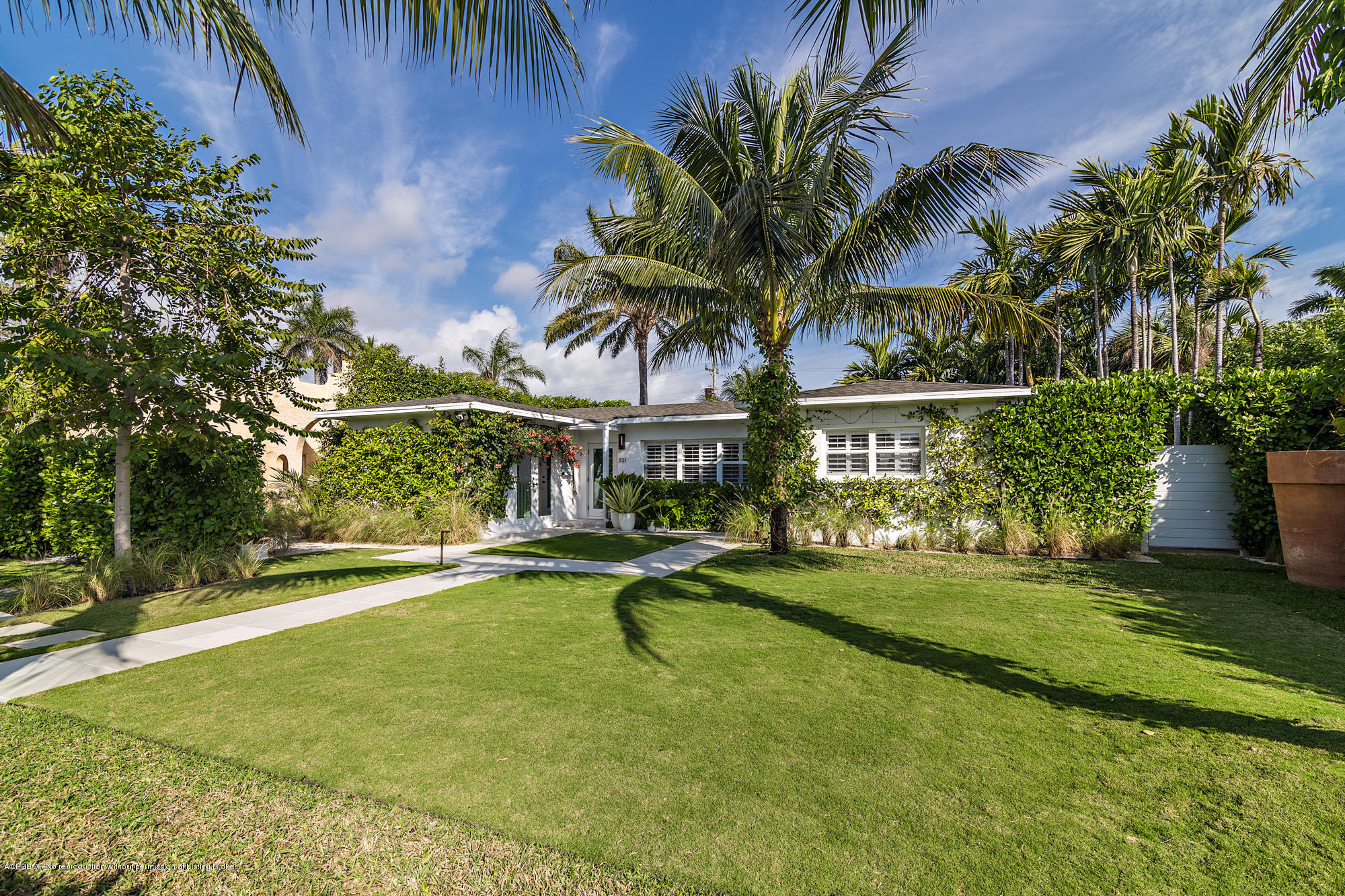 321 Churchill Road West Palm Beach, FL 33405 - Photo 19 of 44 a view of a swimming pool with a table and chairs