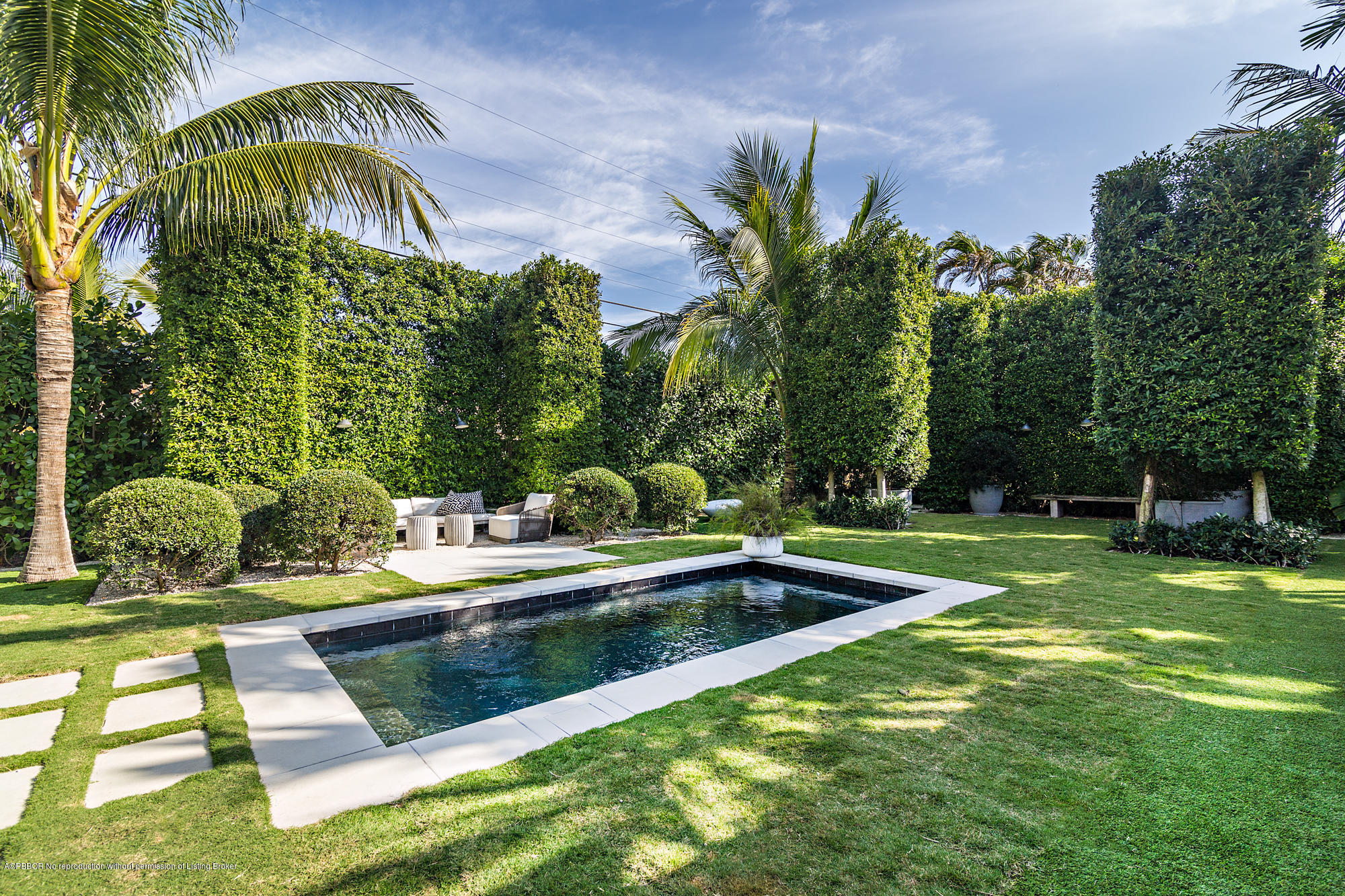 321 Churchill Road West Palm Beach, FL 33405 - Photo 3 of 44 a view of swimming pool with a garden and plants