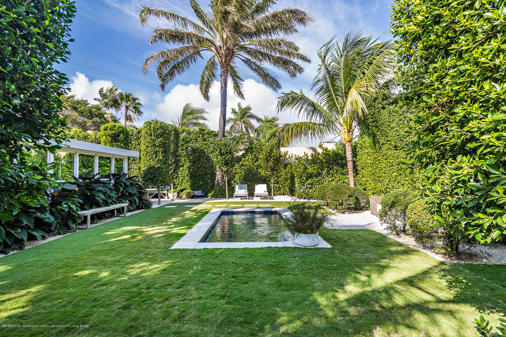 321 Churchill Road West Palm Beach, FL 33405 - Photo 26 of 44 a view of a yard with plants and a fountain