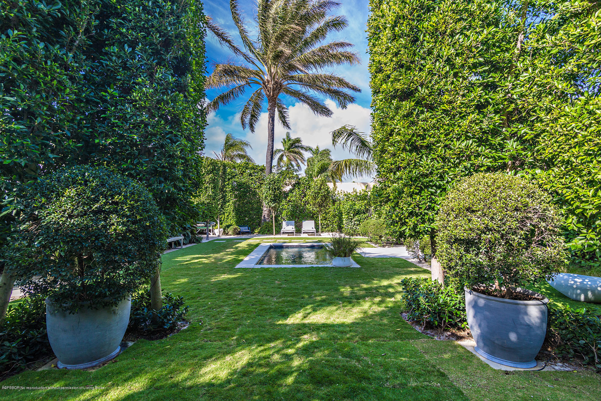 321 Churchill Road West Palm Beach, FL 33405 - Photo 27 of 44 a view of a backyard with plants and a potted plants