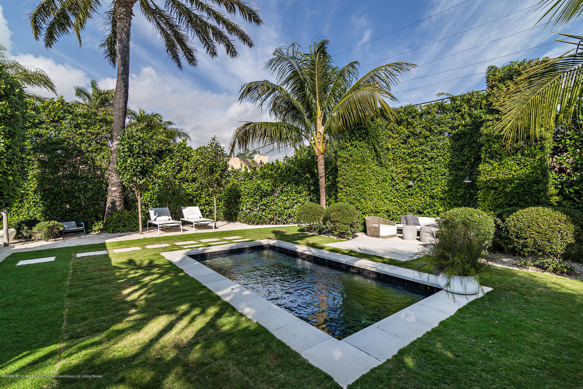 321 Churchill Road West Palm Beach, FL 33405 - Photo 29 of 44 a view of a house with pool and sitting area
