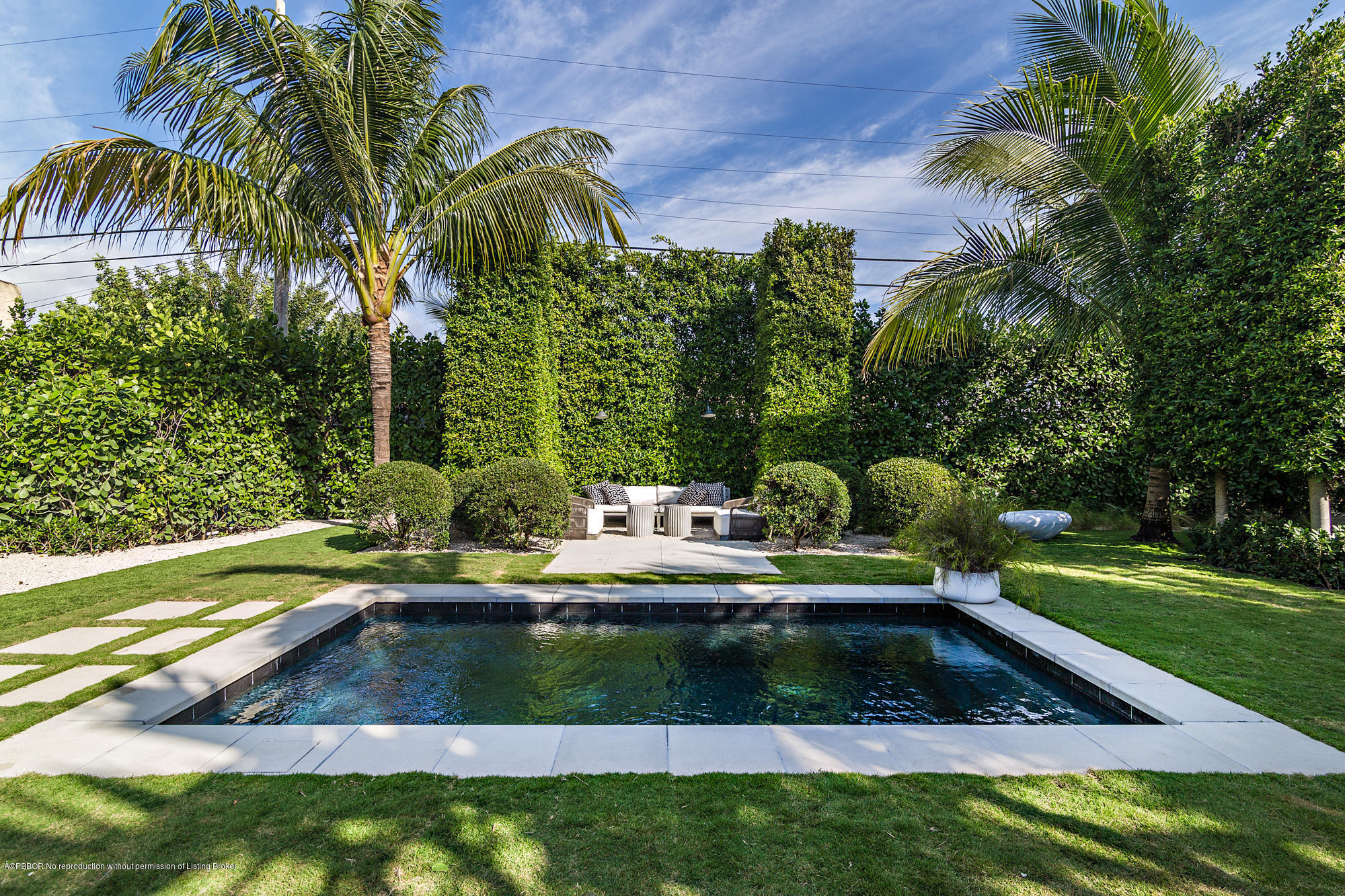 321 Churchill Road West Palm Beach, FL 33405 - Photo 30 of 44 a view of yard with swimming pool and outdoor seating