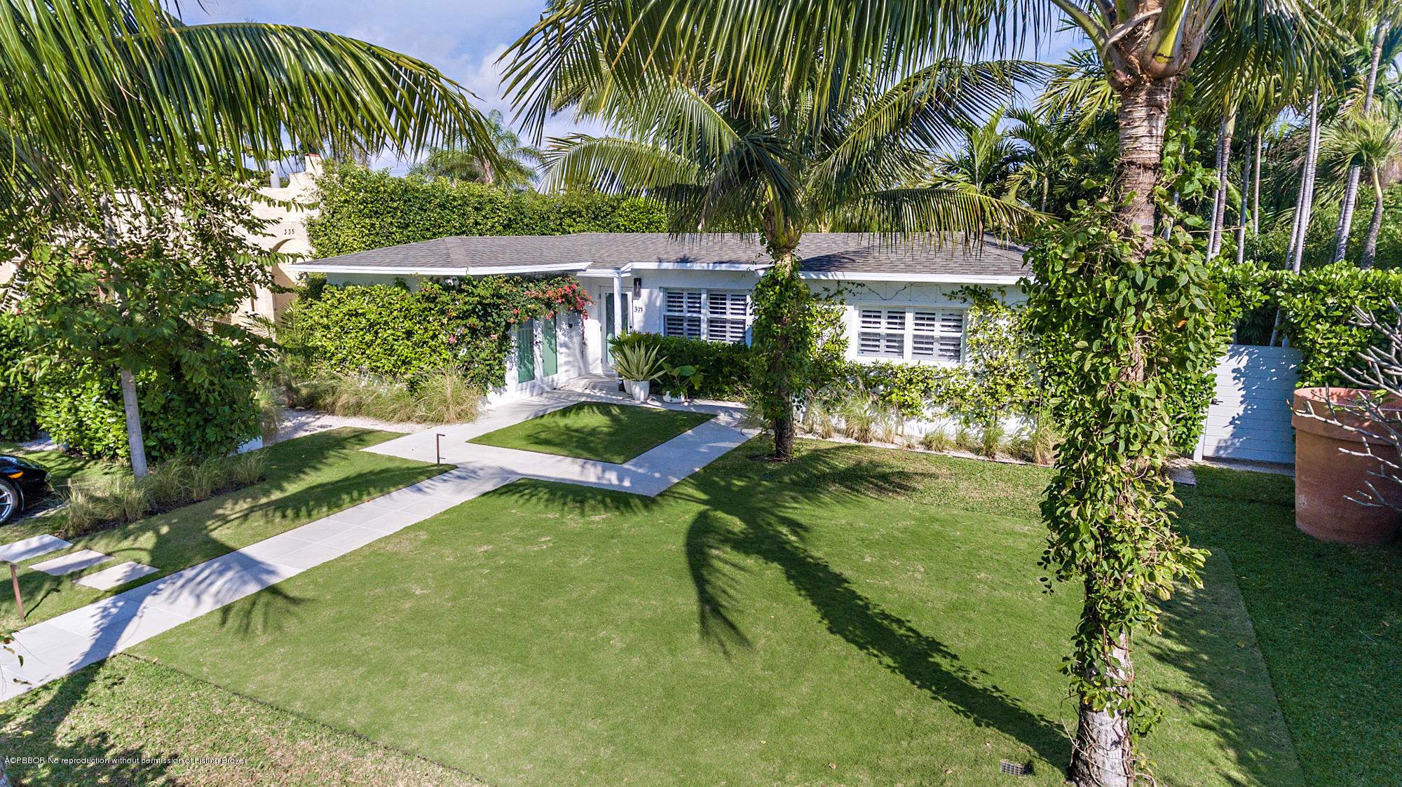 321 Churchill Road West Palm Beach, FL 33405 - Photo 37 of 44 a view of a garden with a house