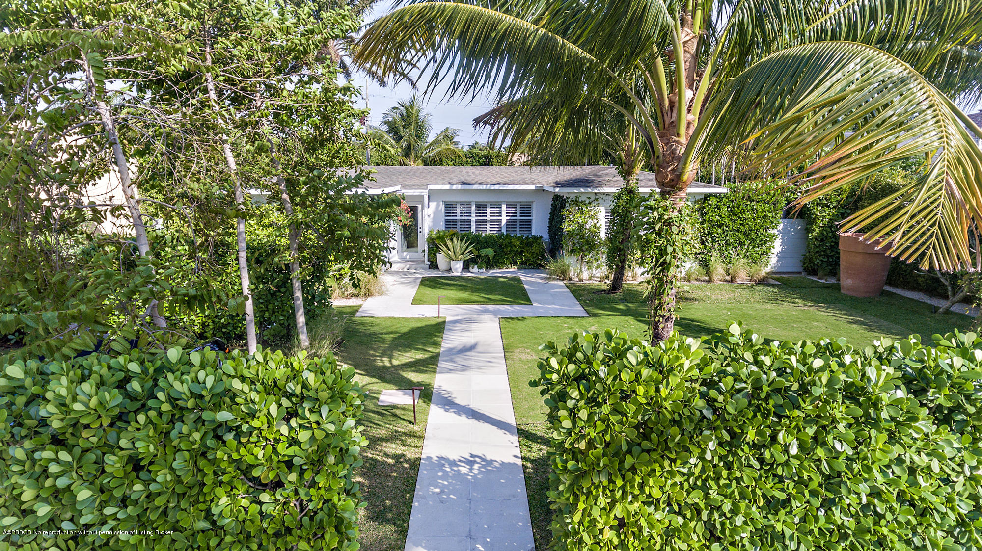 321 Churchill Road West Palm Beach, FL 33405 - Photo 38 of 44 a view of a yard with plants and large trees