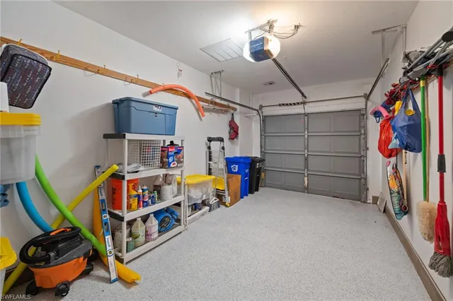 a children room with toys and a fan