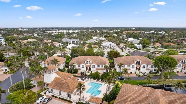 an aerial view of a house with a garden
