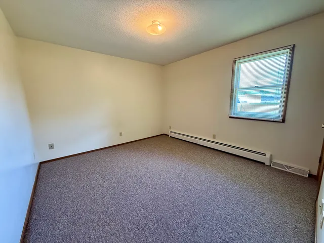 an empty room with a workbench
