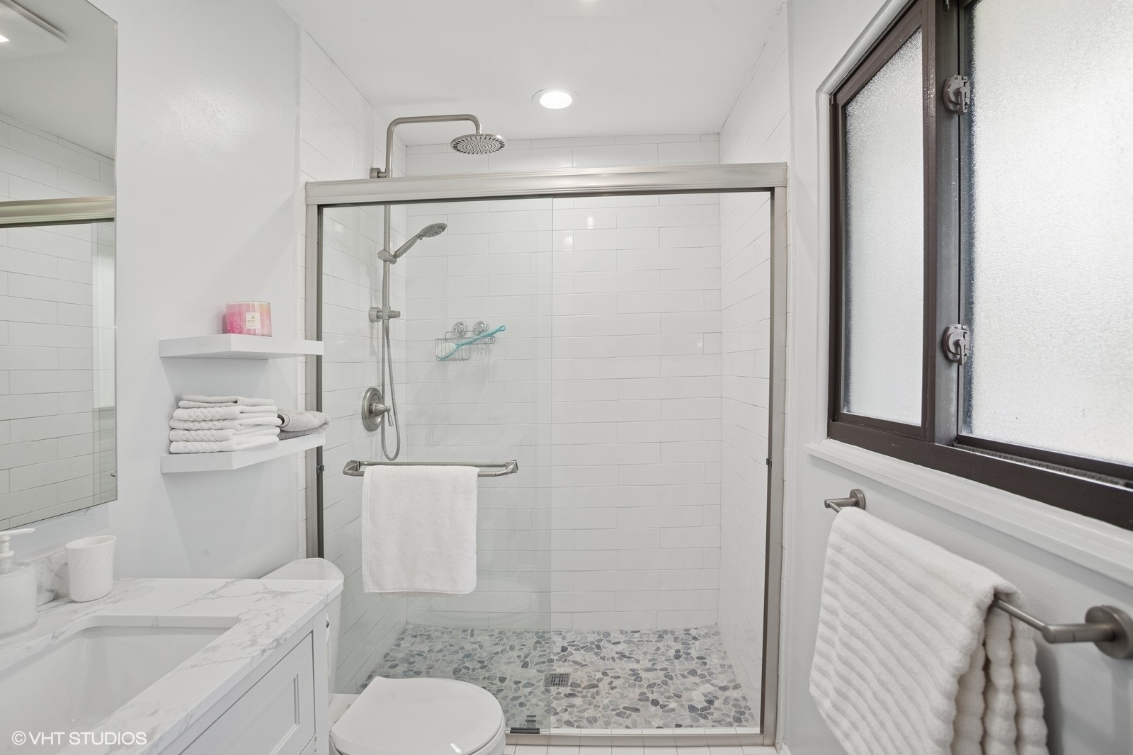 2050 Beechnut Road Northbrook, IL 60062 - Photo 9 of 18 a bathroom with a sink toilet and shower