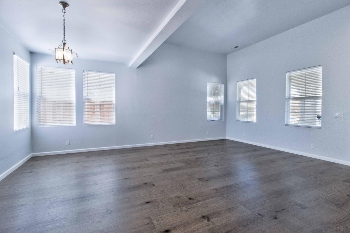 2715 Shellgate Circle Hayward, CA 94545 - Photo 6 of 47 an empty room with wooden floor and windows