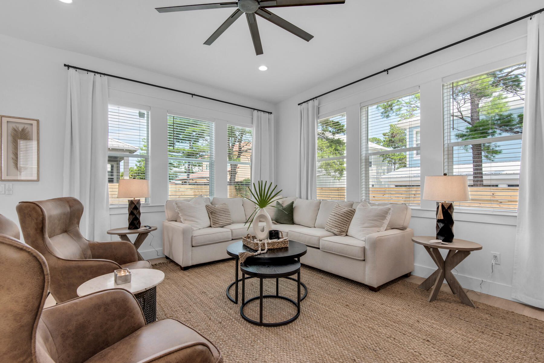 22 Ruth Street Miramar Beach, FL 32550 - Photo 15 of 66 a living room with furniture a flat screen tv and a large window