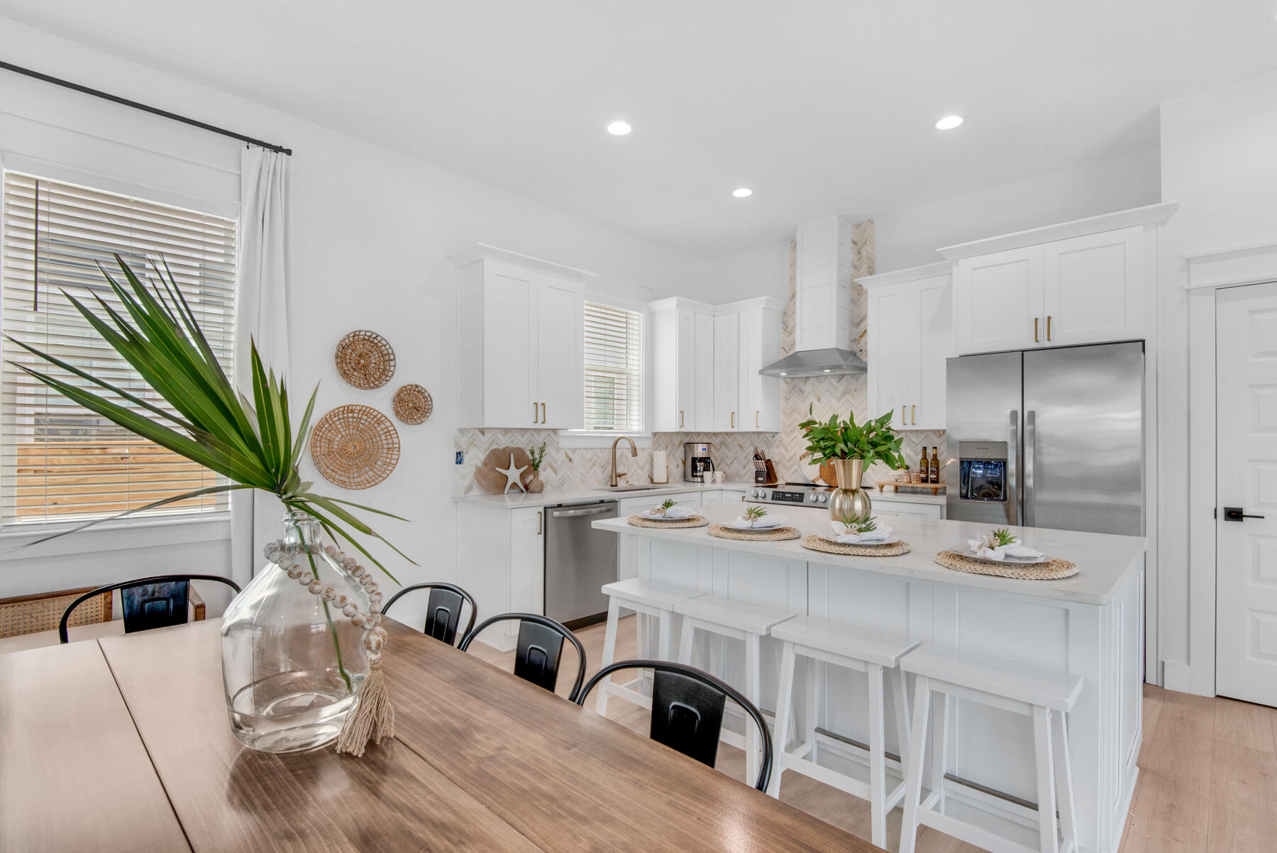 22 Ruth Street Miramar Beach, FL 32550 - Photo 17 of 66 a kitchen with stainless steel appliances kitchen island granite countertop a sink a stove and cabinets
