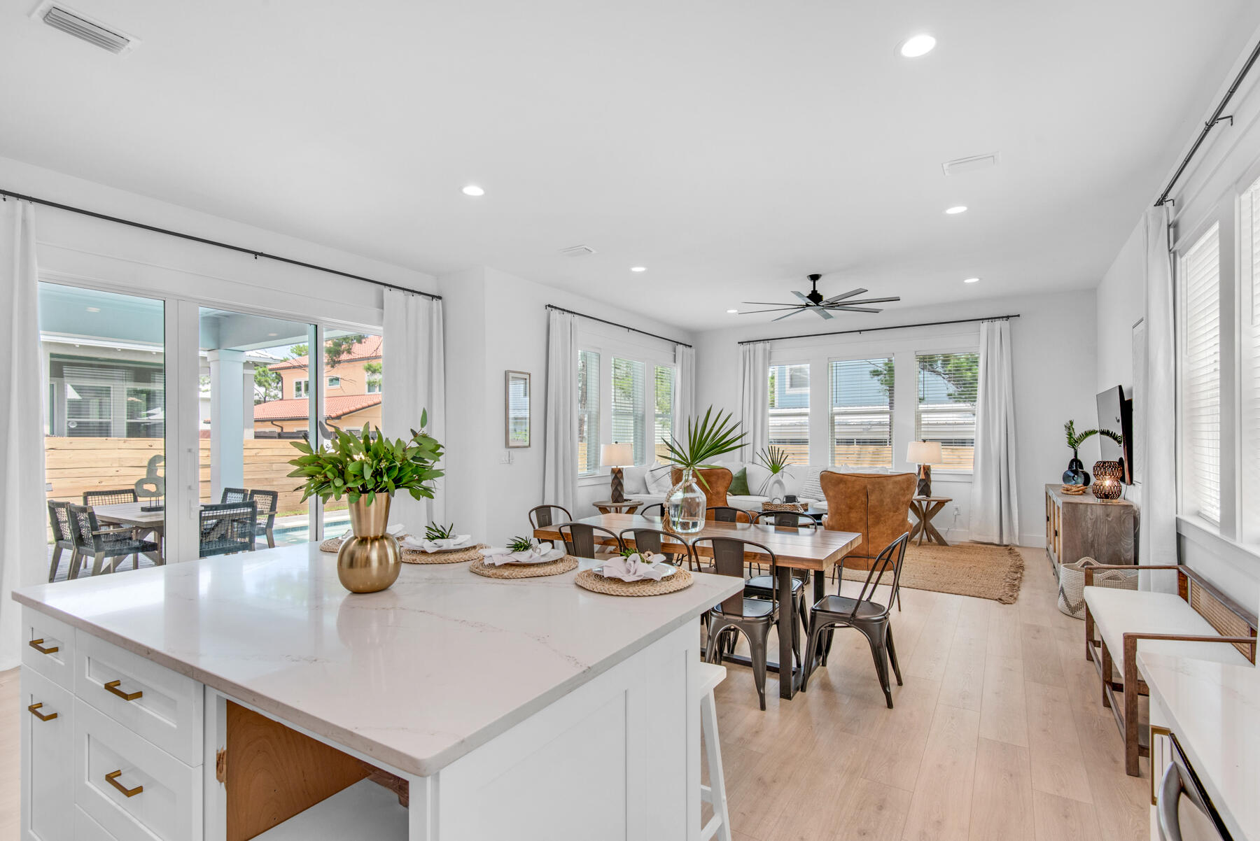 22 Ruth Street Miramar Beach, FL 32550 - Photo 21 of 66 a view of a dining room with furniture and wooden floor