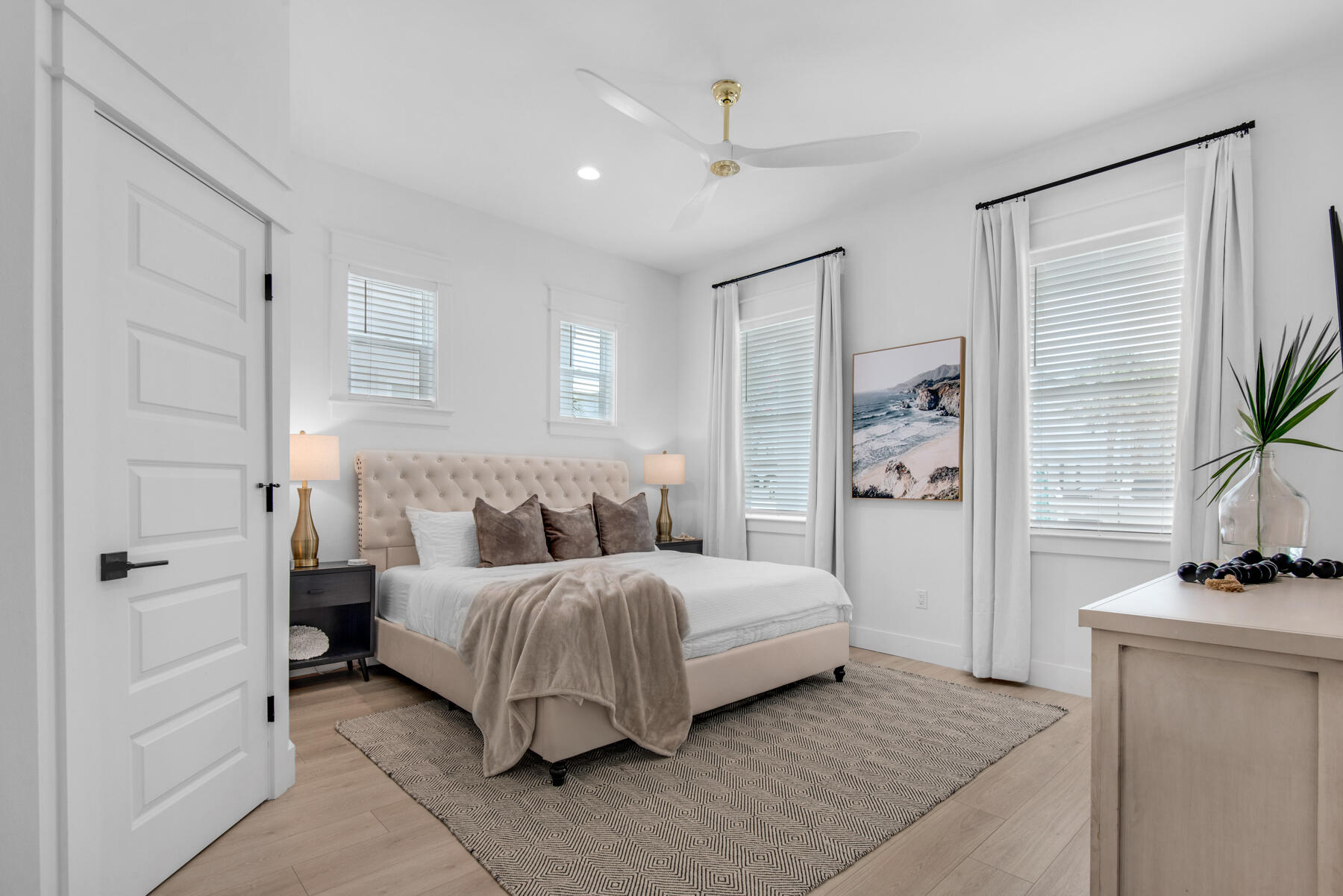 22 Ruth Street Miramar Beach, FL 32550 - Photo 23 of 66 a bedroom with a bed and a potted plant