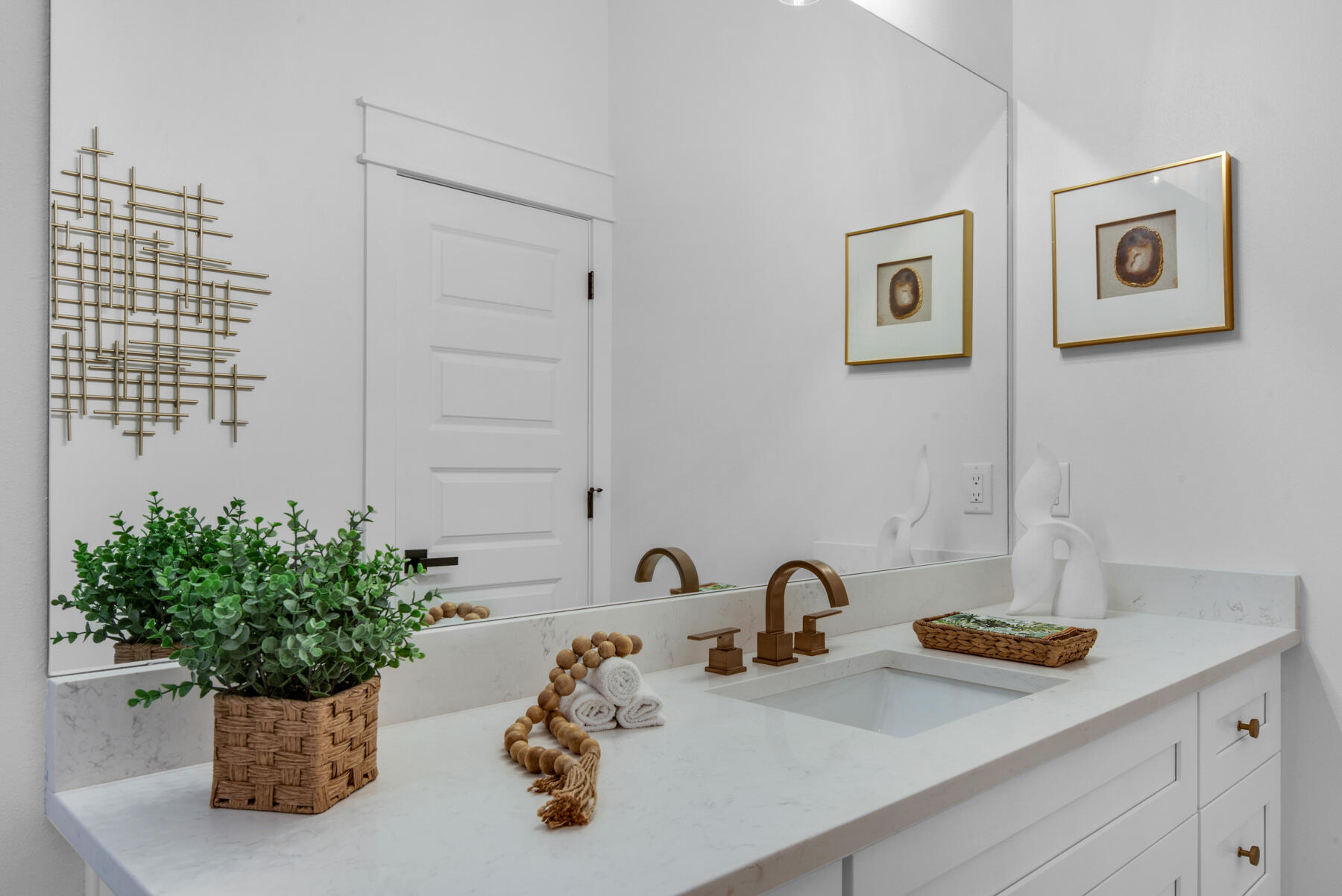 22 Ruth Street Miramar Beach, FL 32550 - Photo 27 of 66 a bathroom with a sink a potted plant and a shower