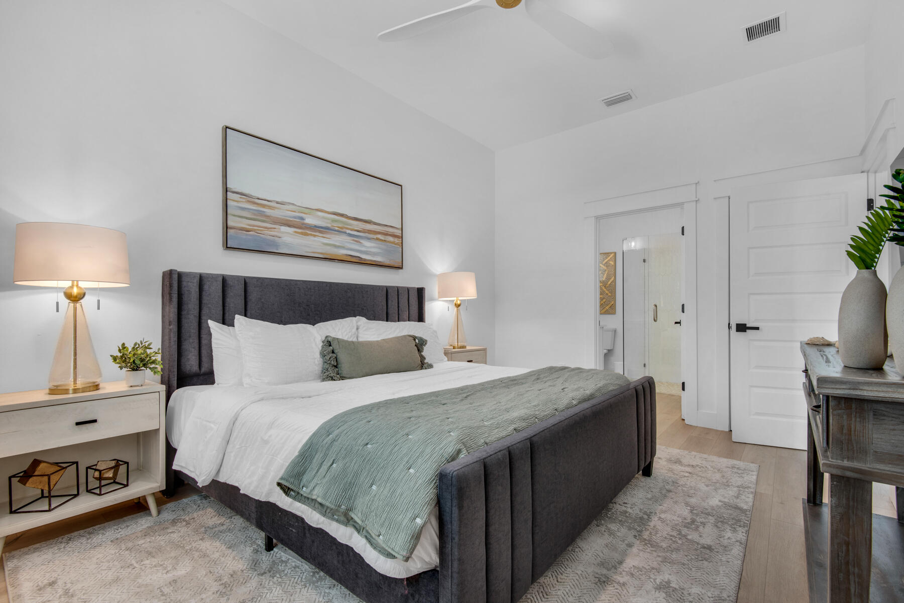 22 Ruth Street Miramar Beach, FL 32550 - Photo 30 of 66 a bedroom with a bed and a lamp on table