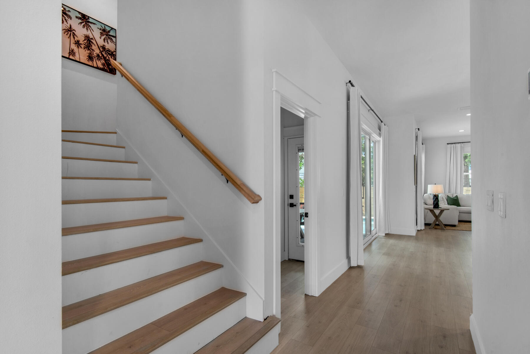 22 Ruth Street Miramar Beach, FL 32550 - Photo 35 of 66 a view of a hallway with staircase and white walls