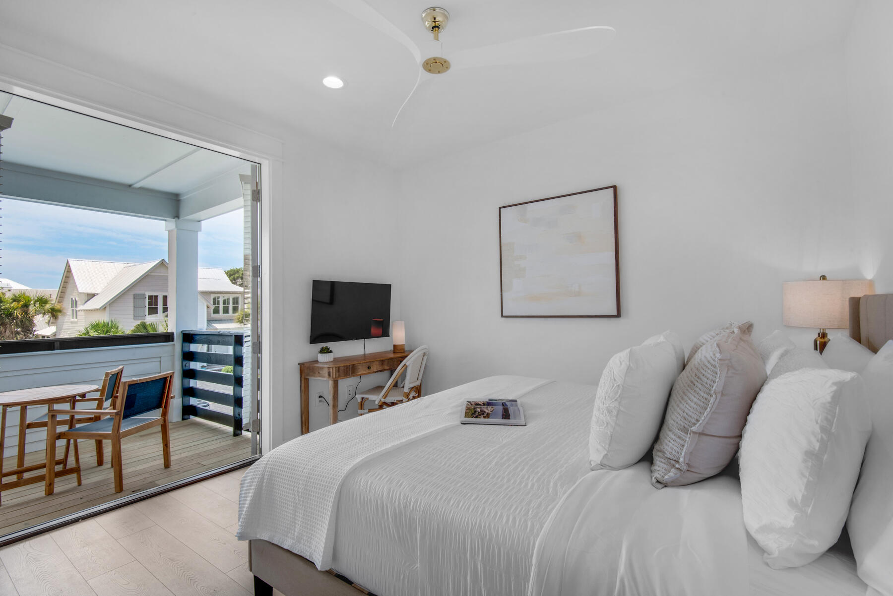 22 Ruth Street Miramar Beach, FL 32550 - Photo 37 of 66 a bedroom with a bed and a flat screen tv