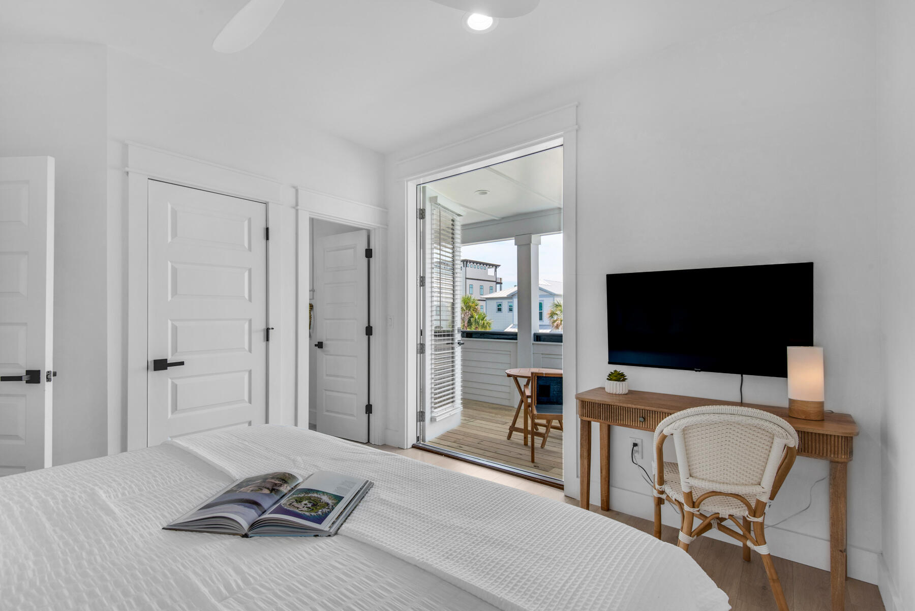 22 Ruth Street Miramar Beach, FL 32550 - Photo 38 of 66 a bedroom with a bed and a flat screen tv