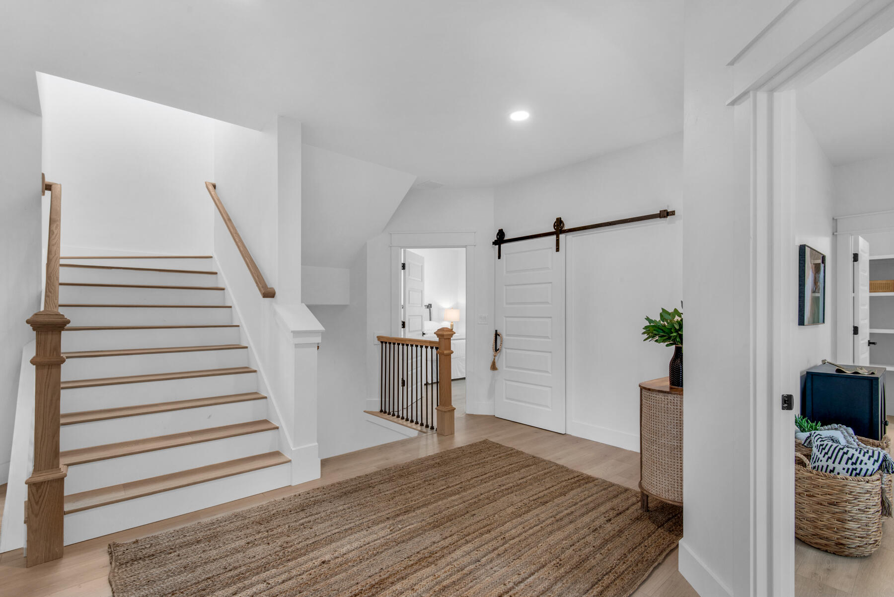 22 Ruth Street Miramar Beach, FL 32550 - Photo 42 of 66 a view of a livingroom with wooden floor and stairs