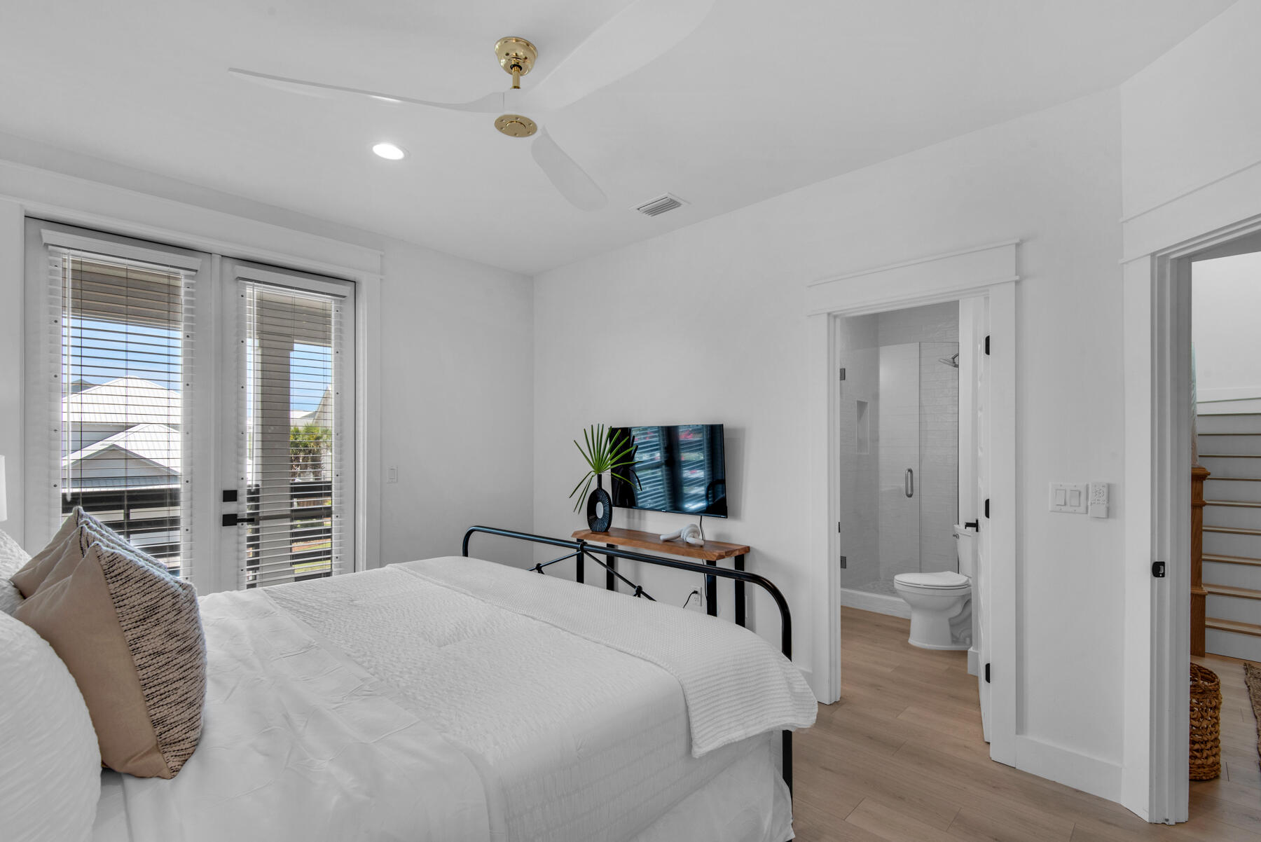 22 Ruth Street Miramar Beach, FL 32550 - Photo 44 of 66 a bedroom with a bed and a large mirror on the dresser