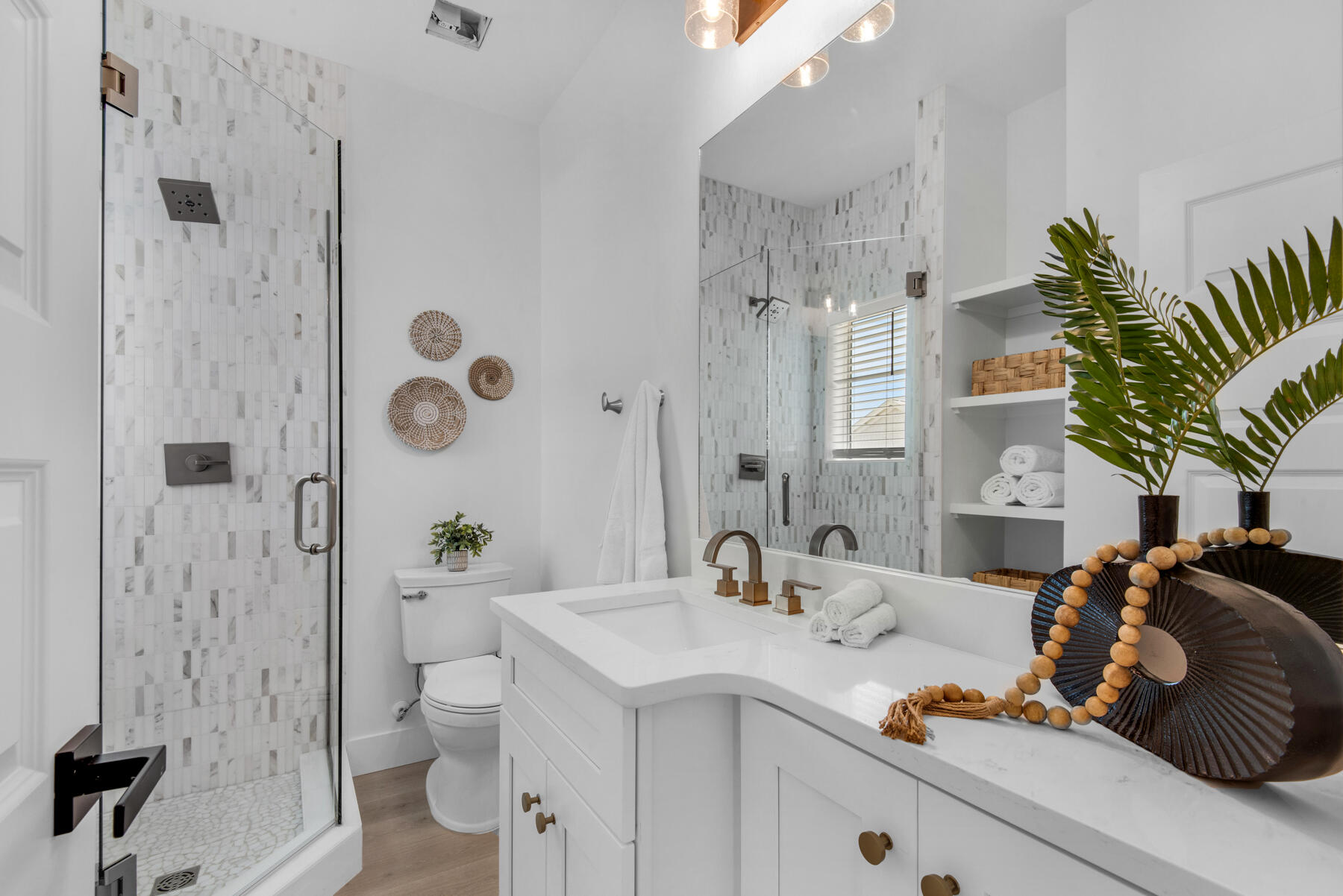 22 Ruth Street Miramar Beach, FL 32550 - Photo 48 of 66 a bathroom with a granite countertop sink a toilet and shower