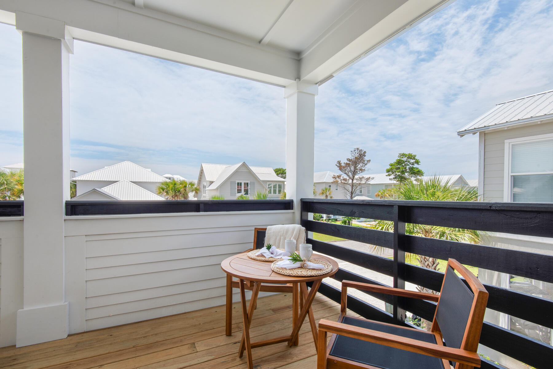 22 Ruth Street Miramar Beach, FL 32550 - Photo 49 of 66 a view of a room with furniture and wooden floor
