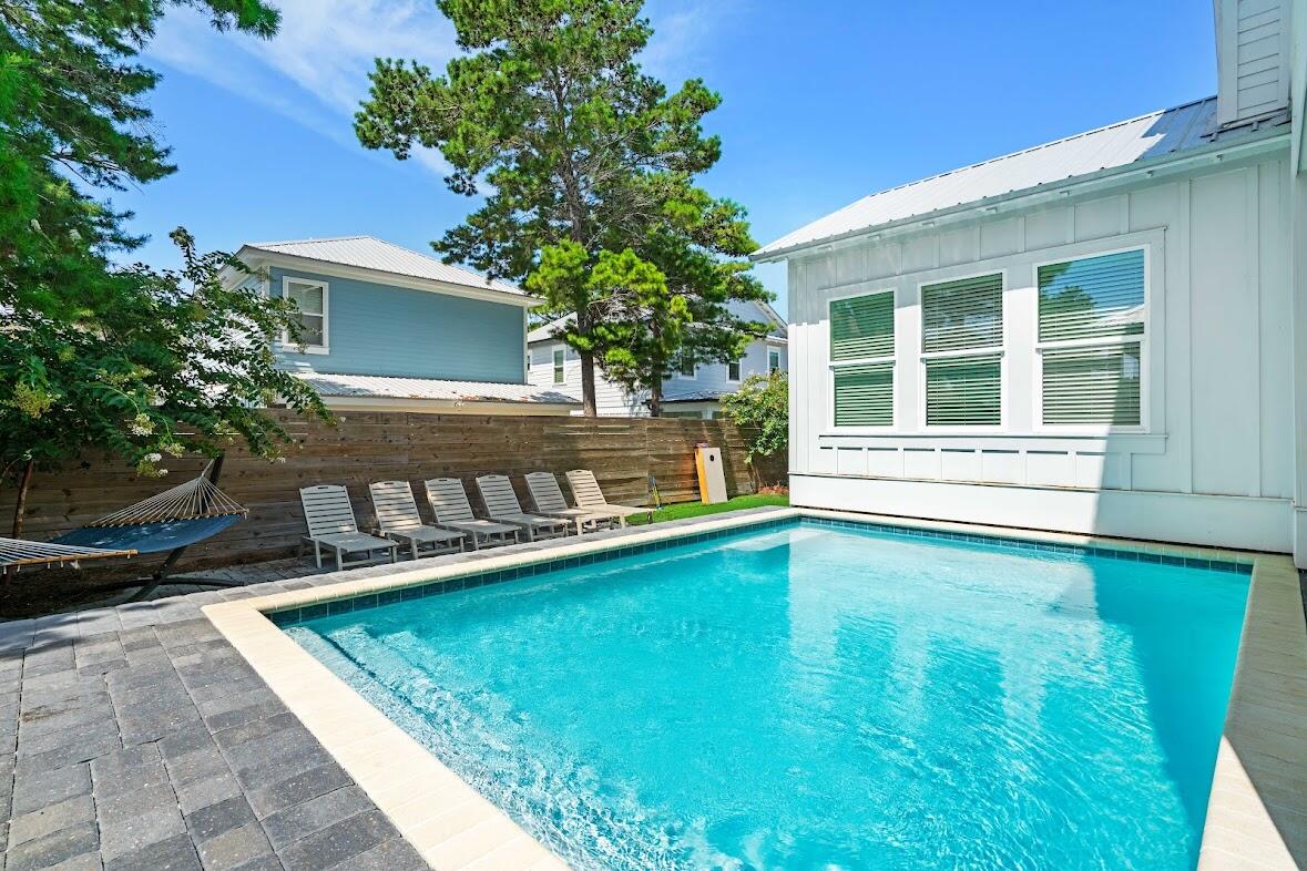 22 Ruth Street Miramar Beach, FL 32550 - Photo 5 of 66 a view of a house with swimming pool in front of it