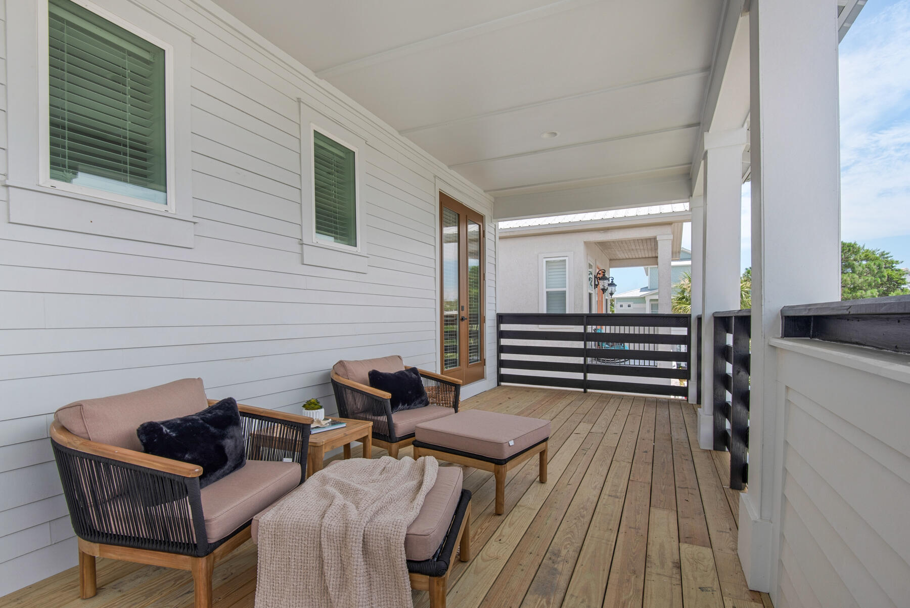 22 Ruth Street Miramar Beach, FL 32550 - Photo 52 of 66 a backyard of a house with barbeque oven and furniture